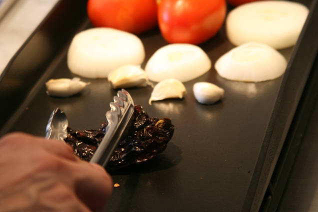 Three kinds of dried chiles get toasted before being soaked in water.